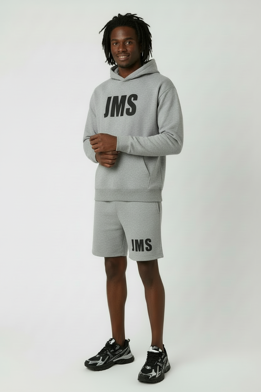 JMS Gray Pose Logo Visible